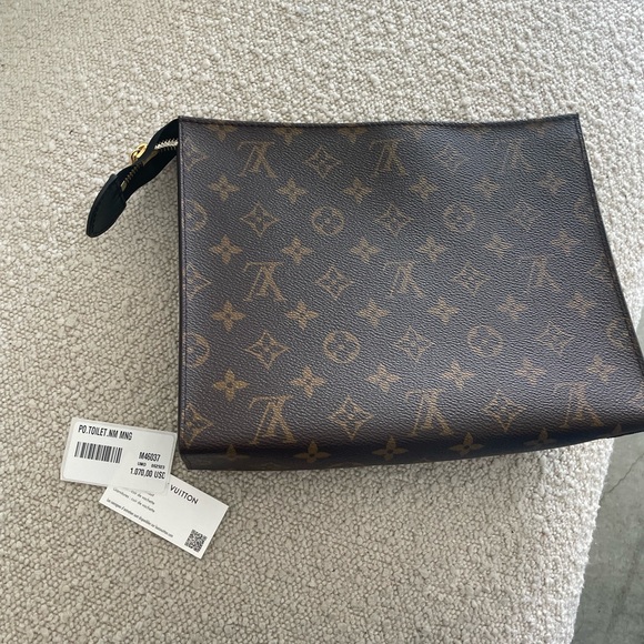 Louis Vuitton Poche Toilette NM brand new with tag - Picture 1 of 4